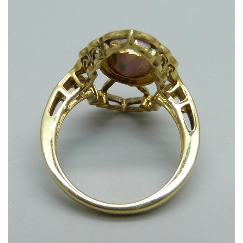 1013 - A silver gilt dress ring, O