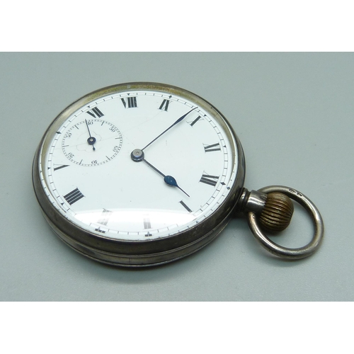 1021 - An engine turned silver cased pocket watch, London import mark for 1910