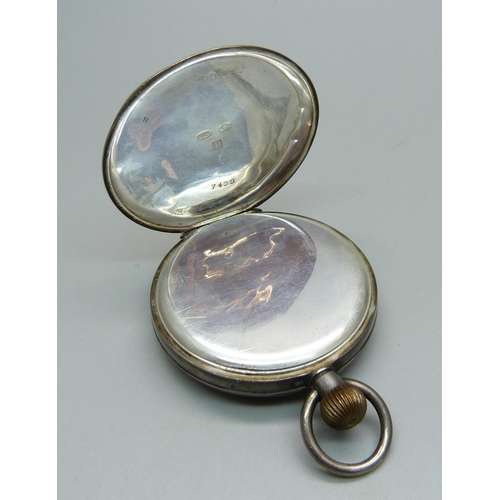 1021 - An engine turned silver cased pocket watch, London import mark for 1910