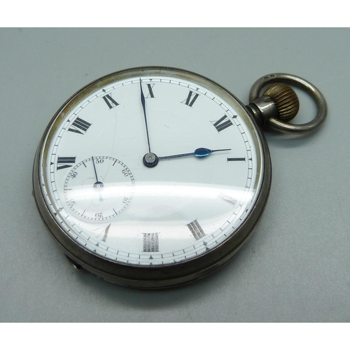 1021 - An engine turned silver cased pocket watch, London import mark for 1910