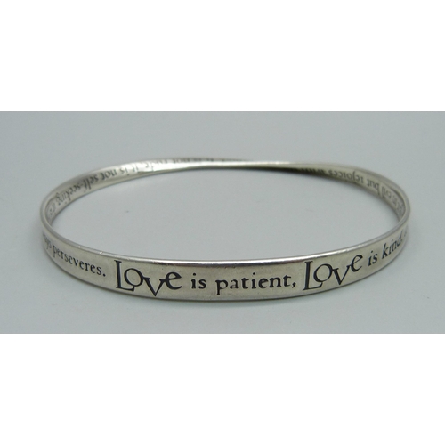 1024 - A silver motto bangle, 15g