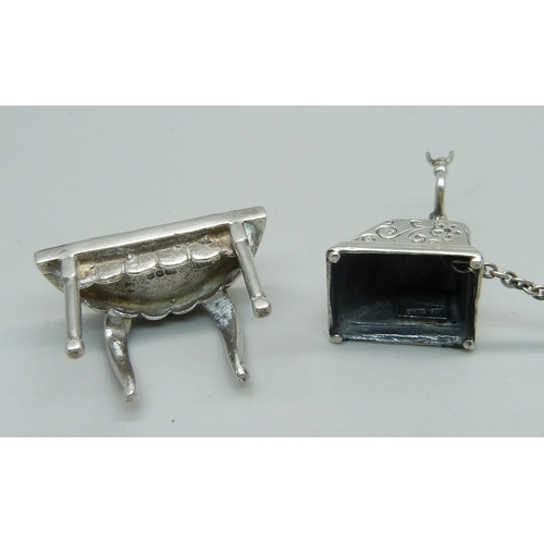 1027 - A hallmarked novelty miniature silver telephone and a similar side table set with bloodstone, table ... 