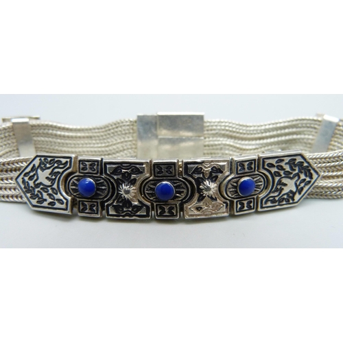 1031 - A 925 silver and blue stone bracelet, 17.5cm