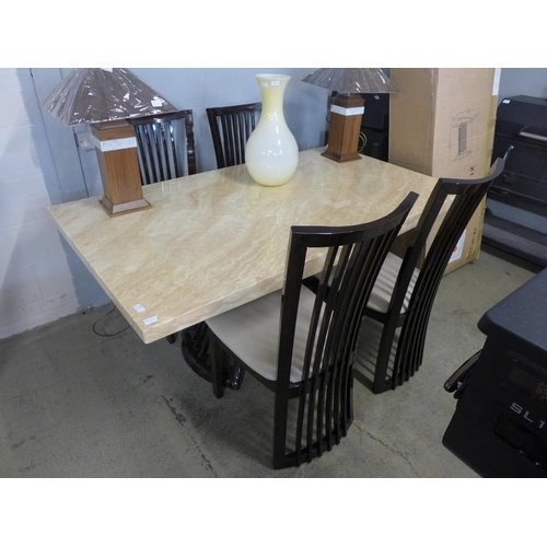 1605 - A marble effect dining table and four chairs