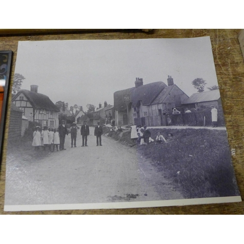 1075 - A wooden cabinet, carved wooden animals, plate, etc. **PLEASE NOTE THIS LOT IS NOT ELIGIBLE FOR POST... 