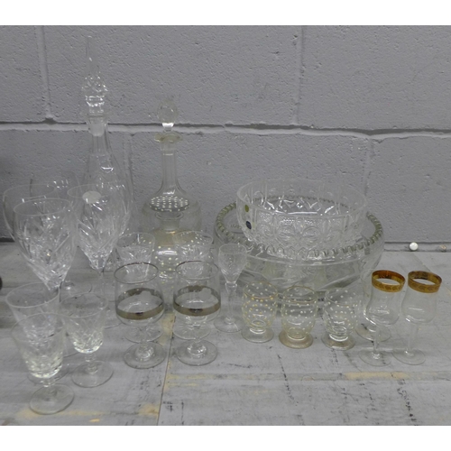 1093 - A collection of glassware including drinking glasses, decanters, etc. **PLEASE NOTE THIS LOT IS NOT ... 