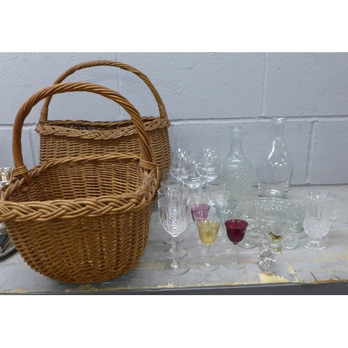 1096 - Two mid 20th Century wicker baskets and a collection of crystal and glass including a modern decante... 