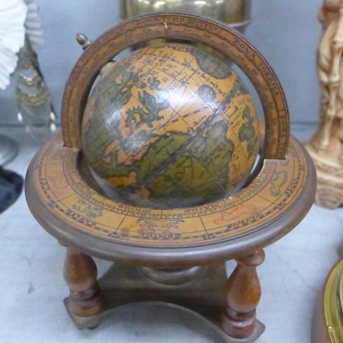 1104 - A barometer, an oil lamp, a figure and a globe **PLEASE NOTE THIS LOT IS NOT ELIGIBLE FOR POSTING AN... 