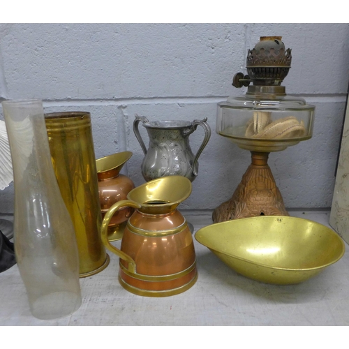 1113 - Copper and brassware including shell art vase, a pewter goblet and a paraffin lamp **PLEASE NOTE THI... 