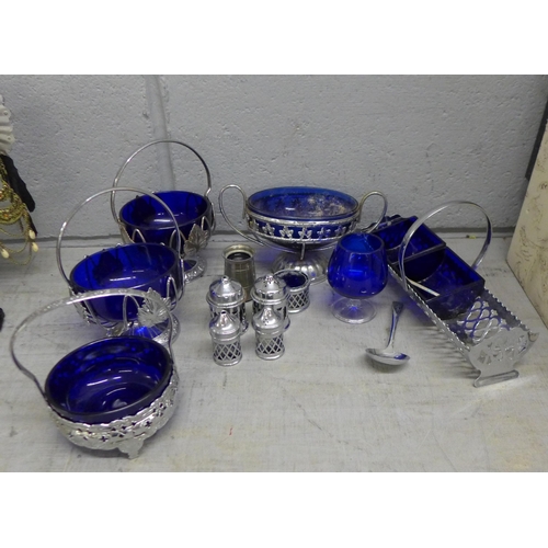 1119 - Three boxes; a collection of chrome mounted blue glass, two clocks, a Coalport pot, cream and sugar,... 