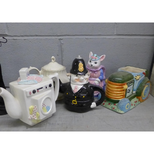 1120 - Two boxes of teapots, many novelty