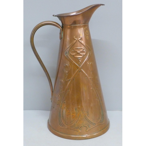 602 - A copper Art Nouveau pitcher, JS&S backstamp, 27cm