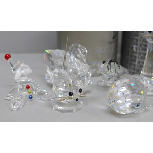 630 - A collection of twelve Swarovski animals including two boxed