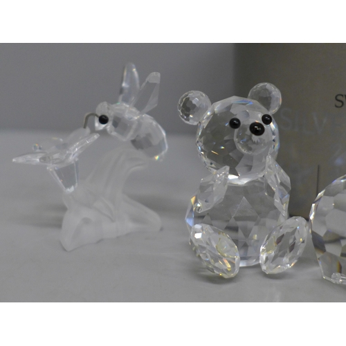 635 - A collection of eight Swarovski animals including two boxed