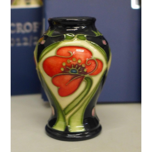 644 - Fourteen Moorcroft Design Collection catalogues, two Moorcroft cards and a miniature vase