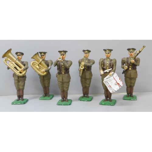 652 - A set of six 1940s military band lead soldiers