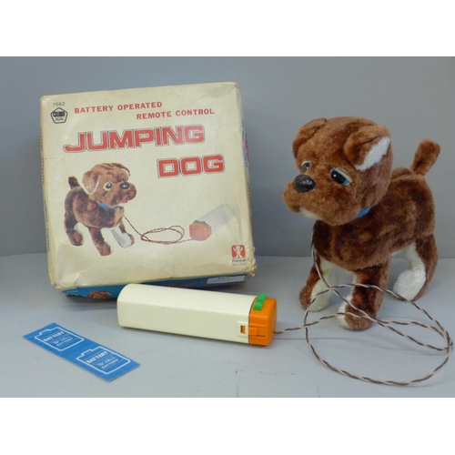 657 - A Bandai Iwaya Hong Kong battery operated jumping dog, boxed