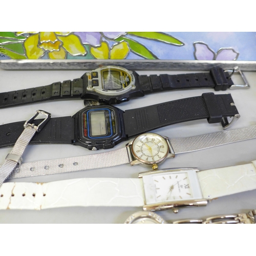 661 - A Timex Ironman Triathlon watch, other lady's and gentleman's watches and a vintage Seiko wristwatch... 