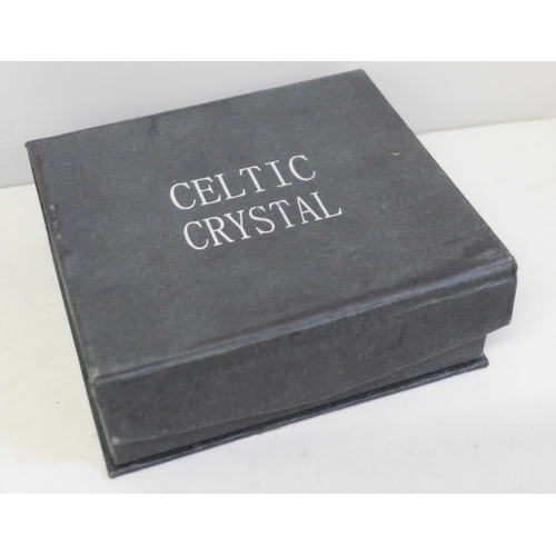 664 - A boxed Celtic crystal clock