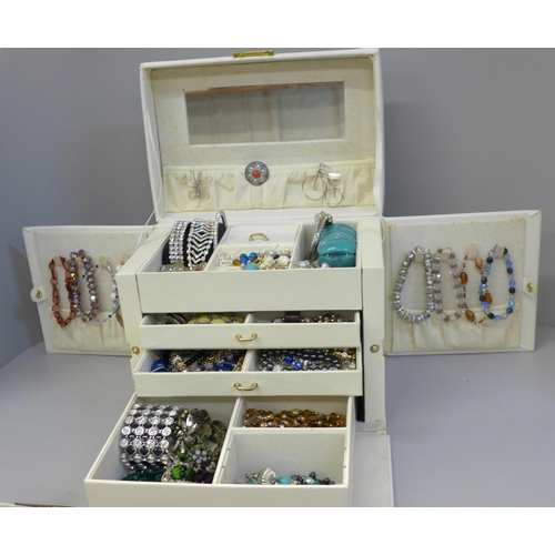 667 - A box of costume jewellery