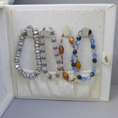 667 - A box of costume jewellery