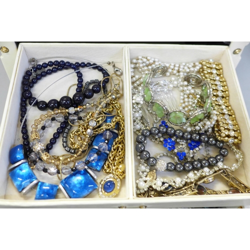 667 - A box of costume jewellery