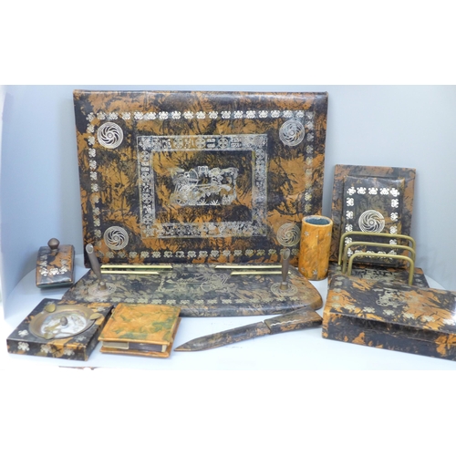 669 - An Egyptian leather desk set (10 items)