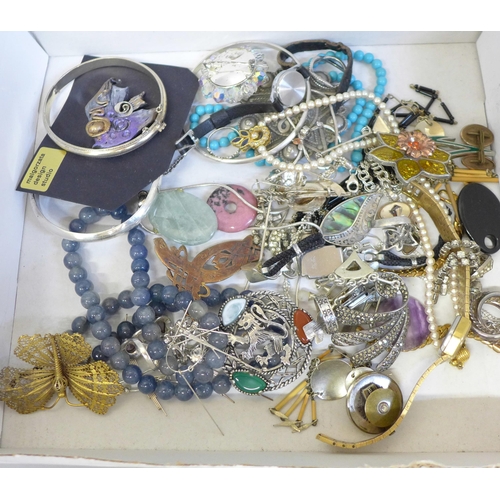 675 - Silver bangles and brooches and other costume jewellery