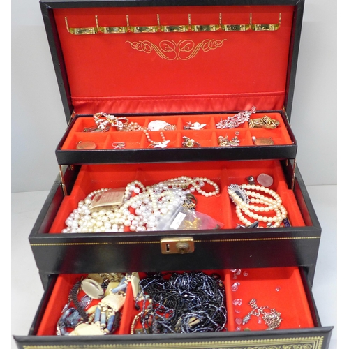 681 - A jewellery box and costume jewellery