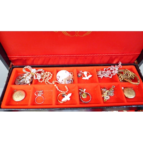 681 - A jewellery box and costume jewellery