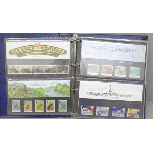 691 - Stamps; an album of GB presentation packs (36)