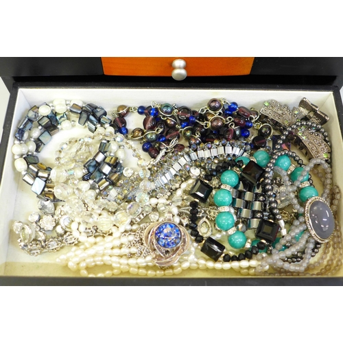 692 - A box of costume jewellery