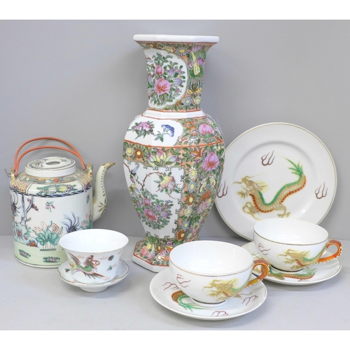 694 - A Chinese teapot, oriental vase, cup and saucer, two Geisha girl cups, saucers and a side plate