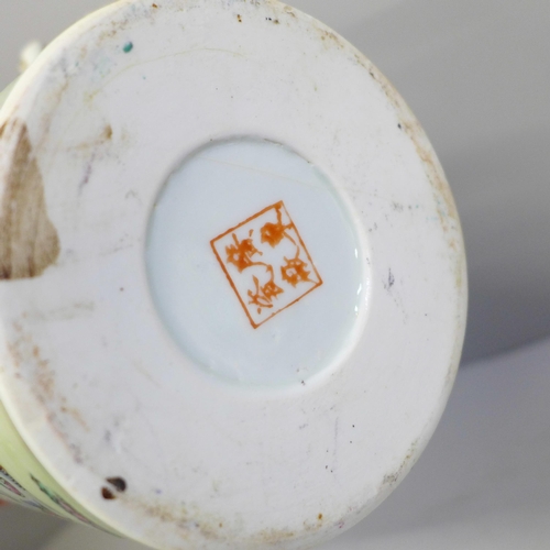 694 - A Chinese teapot, oriental vase, cup and saucer, two Geisha girl cups, saucers and a side plate