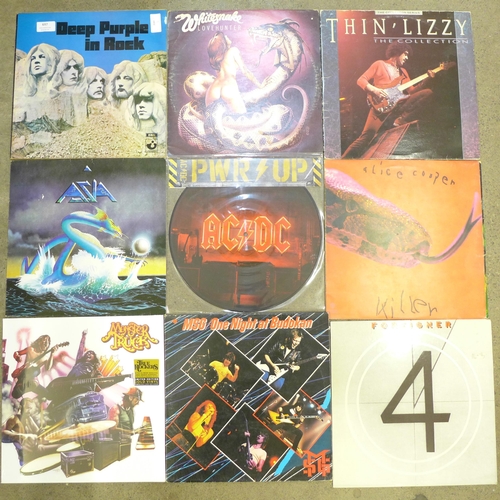 697 - Twelve rock LP records, mainly 1970s