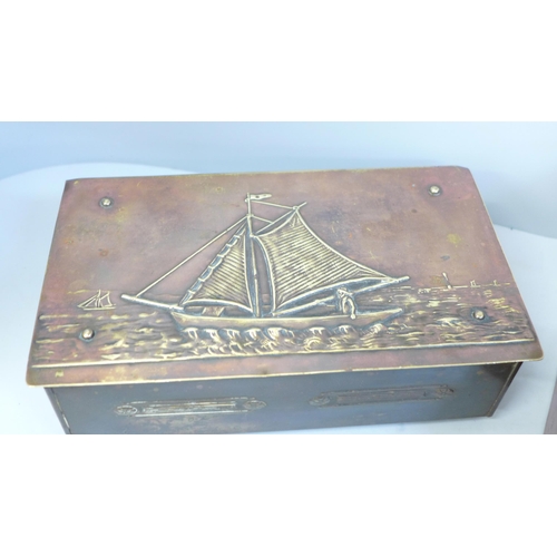 711 - An Arts and Crafts wooden box and a mixed metal box depicting a Cornish fishing scene to the lid