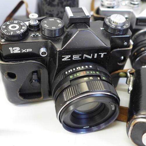 714 - Five Zenit cameras including Zenit B,  Zenit E (x2), TTL and 12XP