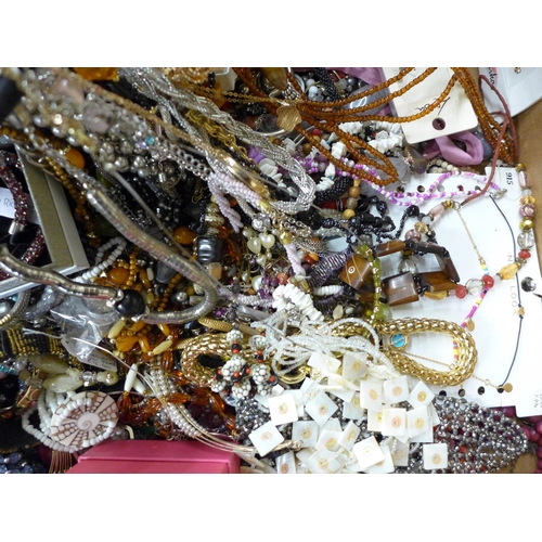 715 - A large box of costume jewellery