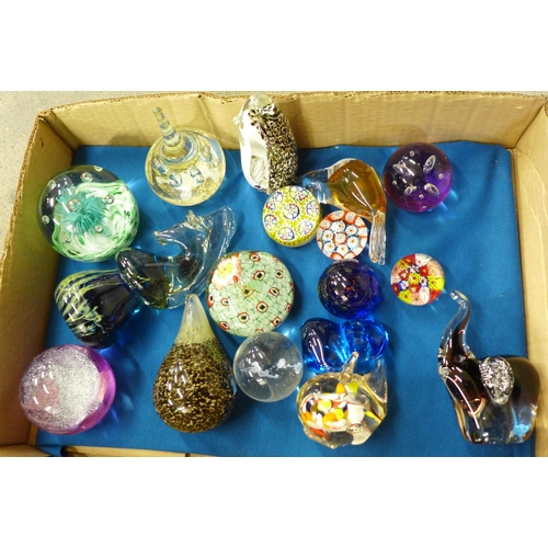 716 - Seventeen glass paperweights including Mdina