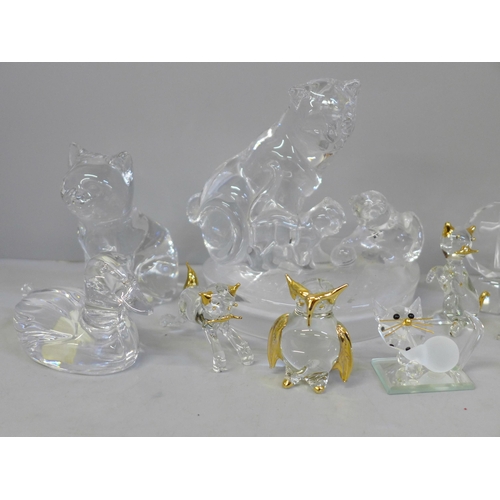 722 - A collection of Swarovski and other lead crystal figures