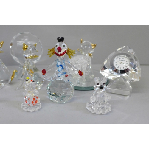 722 - A collection of Swarovski and other lead crystal figures