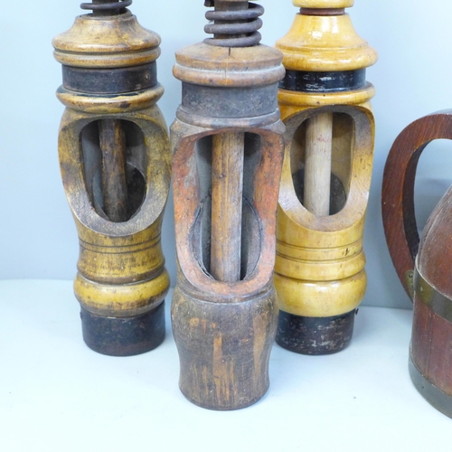 723 - Six wine bottle corkers and a flagon