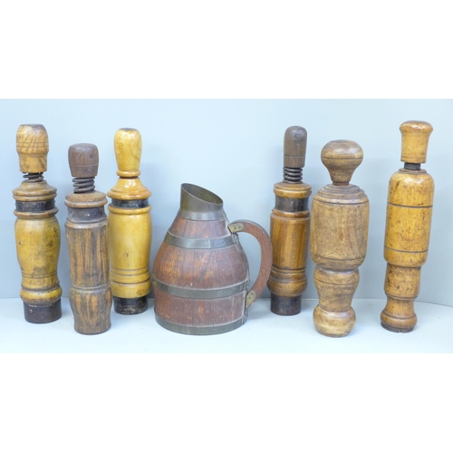 723 - Six wine bottle corkers and a flagon