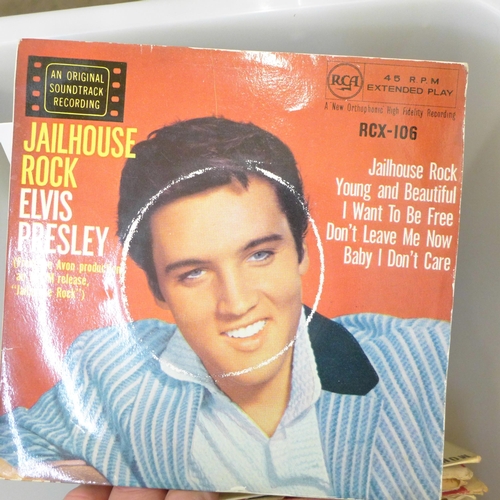 735 - A collection of 45rpm singles, 1960s and 80s including 15 Elvis records, also including Beatles, Bea... 