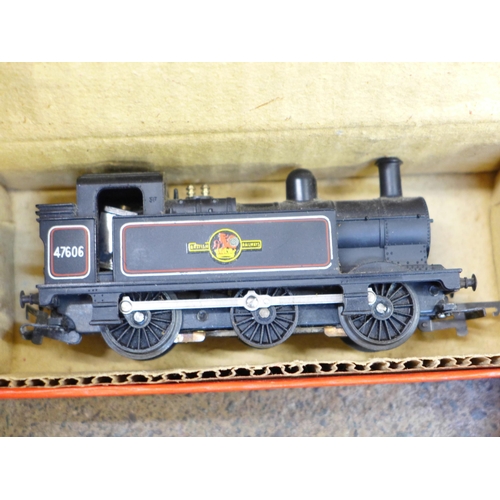 737 - A box of 00 gauge Tri-ang Railways including three tank engines, rolling stock, track, signal box, o... 