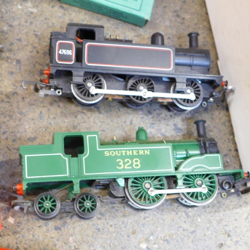 737 - A box of 00 gauge Tri-ang Railways including three tank engines, rolling stock, track, signal box, o... 