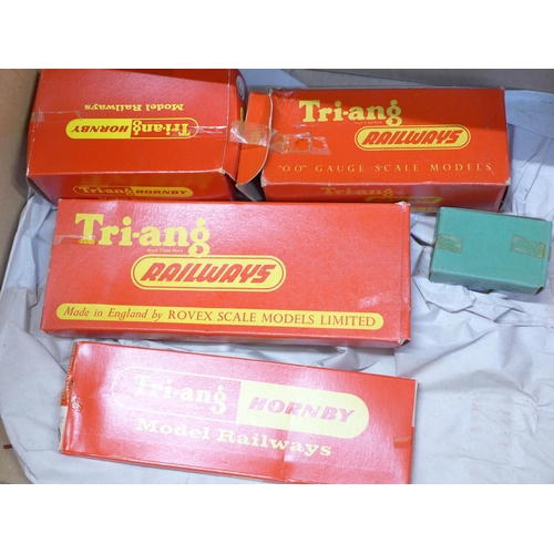 737 - A box of 00 gauge Tri-ang Railways including three tank engines, rolling stock, track, signal box, o... 