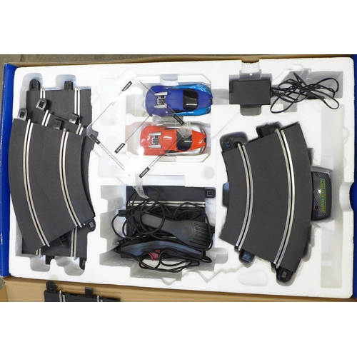 740 - A Scalextric 1:32 scale Bugatti Veyron Blue v Red Hyperdrive set, (tested working), boxed