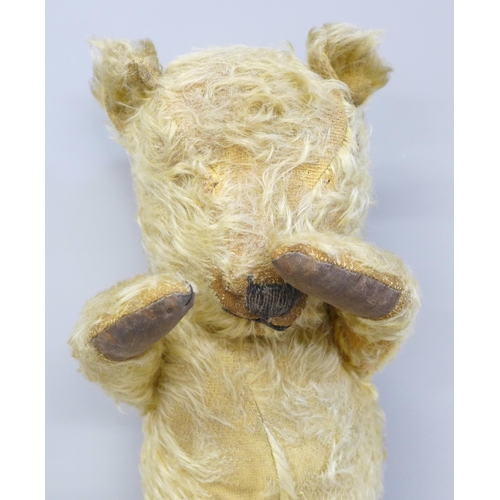 743 - A 1940s Teddy bear, jointed limbs, lacking eyes, 42cm