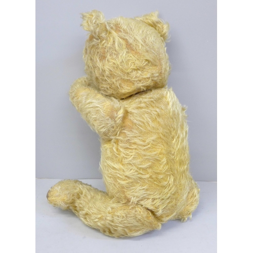 743 - A 1940s Teddy bear, jointed limbs, lacking eyes, 42cm